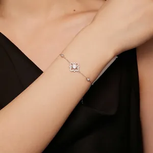 Elegant S925 sterling silver moissanite flower bracelet worn on a woman's wrist