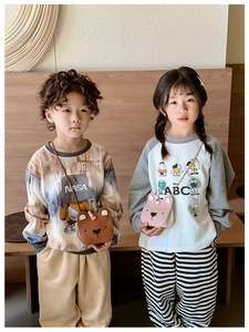 Kids wearing cute cartoon bear crossbody bags with adjustable straps for boys and girls