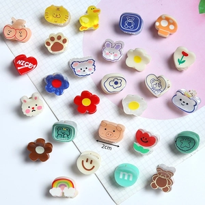 Detail of 2cm mini alloy hair claw clips with rhinestones and colorful cartoon designs