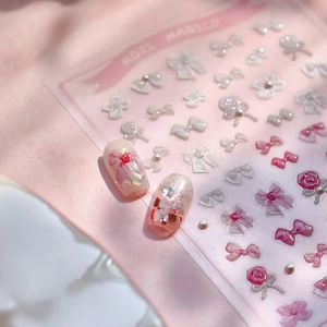 3D embossed nail stickers with pink bows, flowers, and pearls for DIY manicure art