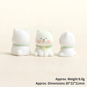 Detailed views of a white flocked puppy figurine with size and weight specifications