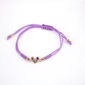 Adjustable purple braided rope bracelet with golden heart pendant and purple zircon