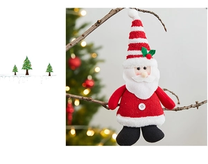 Close-up of Santa Claus knitted ornament with green leaf detail on a festive tree branch