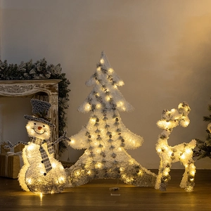 Lighted Christmas decor with LED reindeer snowman and tree for indoor holiday atmosphere