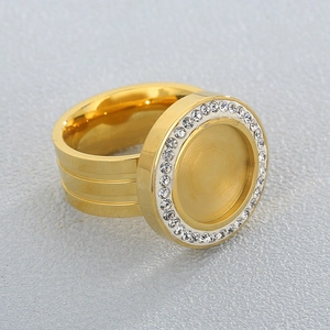 Detailed view of gold-plated multi-layer ring featuring a sparkling rhinestone disc