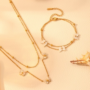 Gold double-layered stainless steel necklace and bracelet set with shell butterfly charms