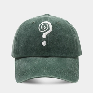 Close-up of vintage washed green baseball cap with white spiral question mark embroidery