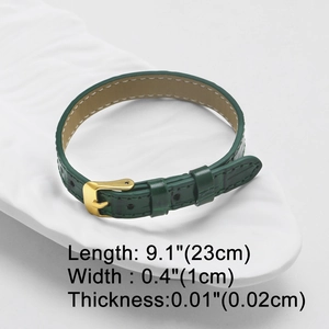 Green crocodile texture strap with gold buckle showing dimensions 23cm length and 1cm width
