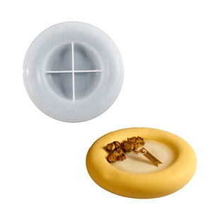DIY silicone ring tray mold for resin and candles with a handmade yellow wax finished sample