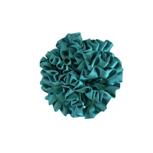 Lush turquoise pleated satin scrunchie with silky sheen on a clean white background