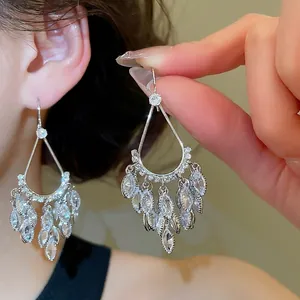 Elegant gold-plated teardrop tassel earrings with sparkling cubic zirconia for women