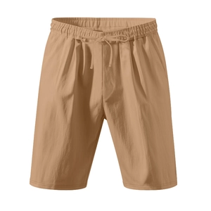 Detailed close-up of khaki linen shorts featuring elastic drawstring waist and fabric texture