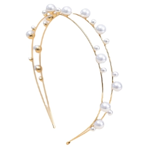 Elegant gold double-layered headband with white pearls in various sizes for hair styling
