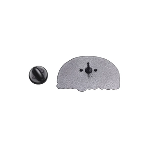 Detailed back view of silver alloy badge with secure black rubber pin clutch backing