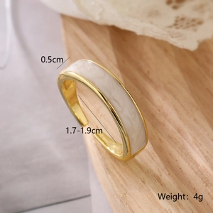 Detailed view of gold plated geometric ring showing 0.5cm width and adjustable sizing