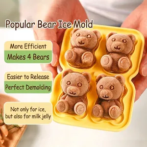 Yellow silicone 4-cavity bear ice cube mold creating detailed frozen bear shapes