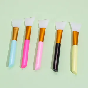 Five-piece silicone facial mask brush set with colorful handles and gold ferrules