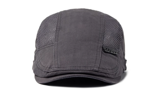 Detail of dark gray beret cap featuring breathable side mesh and BOGUAN woven label