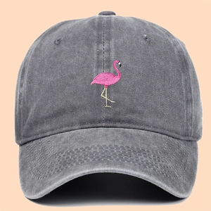 Dark grey washed cotton baseball cap with pink flamingo embroidery for outdoor sun protection
