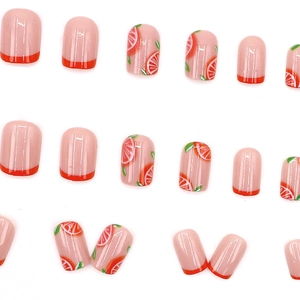 Faux ongles mignons motif orange avec pointes françaises rouges pour femmes