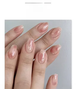 Detail of pink gradient press-on nails with 3D water drop bubble texture JP4099
