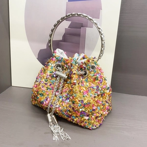 Sparkling multi-colored bucket evening bag with gold base and round crystal handle