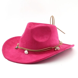 Detail of rose pink suede cowboy hat featuring leather cords, shells and ethnic beads