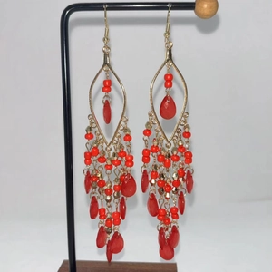 Bohemian vintage long tassel earrings with red beads and golden accents for women