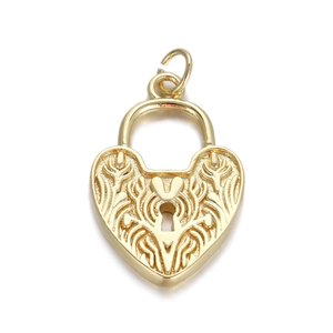 Detailed macro view of a gold heart locket pendant with embossed floral relief pattern