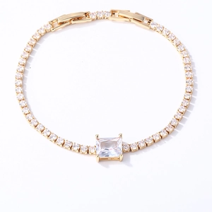 Detail of 18K gold tennis bracelet featuring rectangular zircon and micro-pave crystals