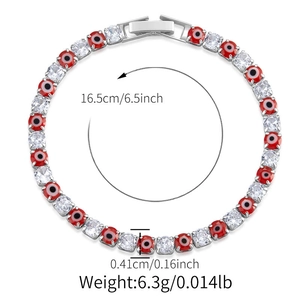 Detail showing red evil eye tennis bracelet with silver metal and zircon measurements