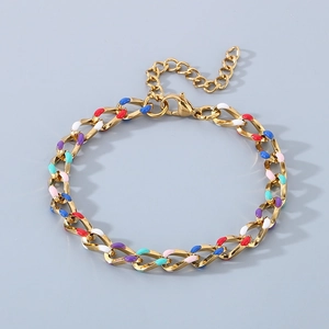 Detail of 18K gold-plated Cuban chain bracelet with colorful enamel links and lobster clasp