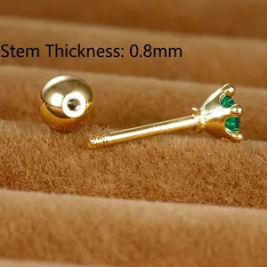 0.8mm gauge gold stainless steel screw back stud earring with a green zircon stone