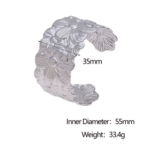 Polished silver floral cuff bracelet details with 35mm width and 55mm inner diameter