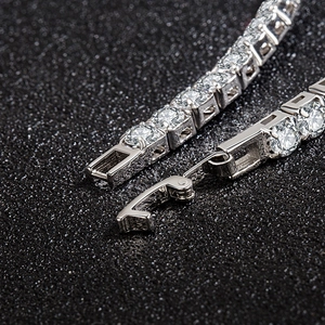 Elegant silver zircon tennis bracelet with rows of clear gems and fold-over clasp