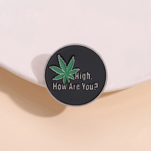 Enamel pin with weed leaf design and 'High, How Are You?' quote on black metal badge