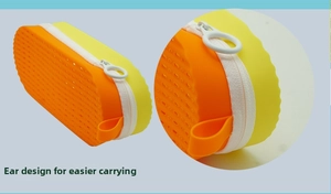 Detail of a bicolored silicone glasses case featuring a side loop for easy carrying
