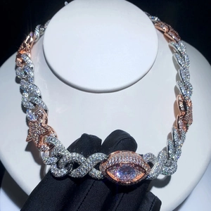 Hip hop star eye pendant necklace with two-tone Cuban chain and cubic zirconia inlay