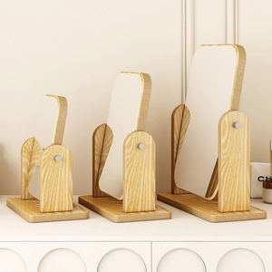 Three-piece set of wooden desktop vanity mirrors in small, medium, and large sizes