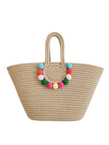 Handmade woven straw tote bag with colorful pom poms and large capacity design