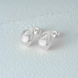 Close-up of S925 sterling silver teardrop stud earrings with pear-cut zircon stones