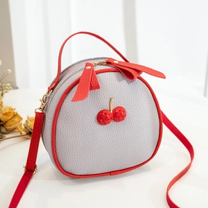 Chic grey lychee pattern round crossbody bag with cherry decor and red trim accents