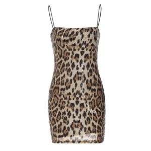Detail of leopard print sequin fabric and thin straps on a bodycon mini dress
