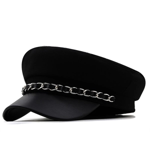 Classic black cotton baker boy hat with leather brim and silver metal chain detail