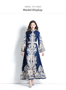 Detail view of vintage long-sleeve floral dress with flare sleeves and baroque print