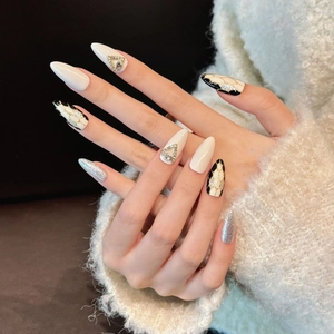 Luxurious grey cat-eye press-on nails with silver glitter and marble stiletto design