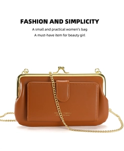 Detail of caramel faux leather bag featuring retro gold metal clasp and chain strap