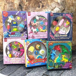 Detailed close-up of creative cartoon eraser sets with space and dinosaur themes