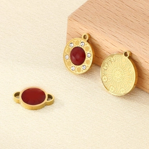 Gold stainless steel celestial pendants with red stones and sun-moon engravings for DIY jewelry