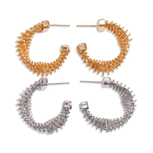 Twisted C-shaped 24k gold plated stud earrings in gold and silver spiral metal design